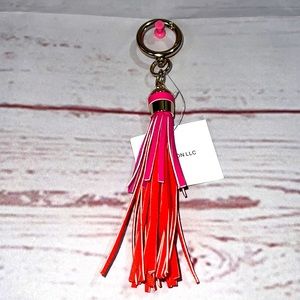 Avon Tassel purse, backpack, keychain, rear view mirror dangle accessory